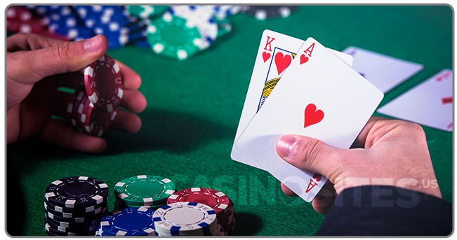 Image of a Blackjack player with cards