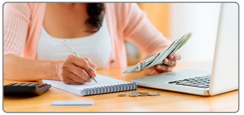 Image of woman keeping track of her bets