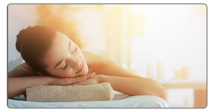 Image of a Women relaxing at a spa Harrah's Resort